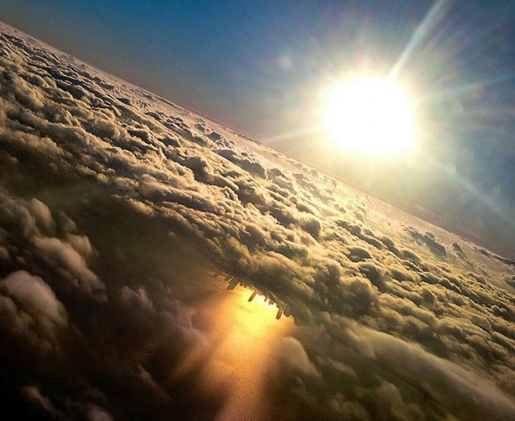 Photo by {link:http://www.boredpanda.com/chicago-skyline-reflection-lake-michigan-mark-hersch/}Marc Hersch{/link}